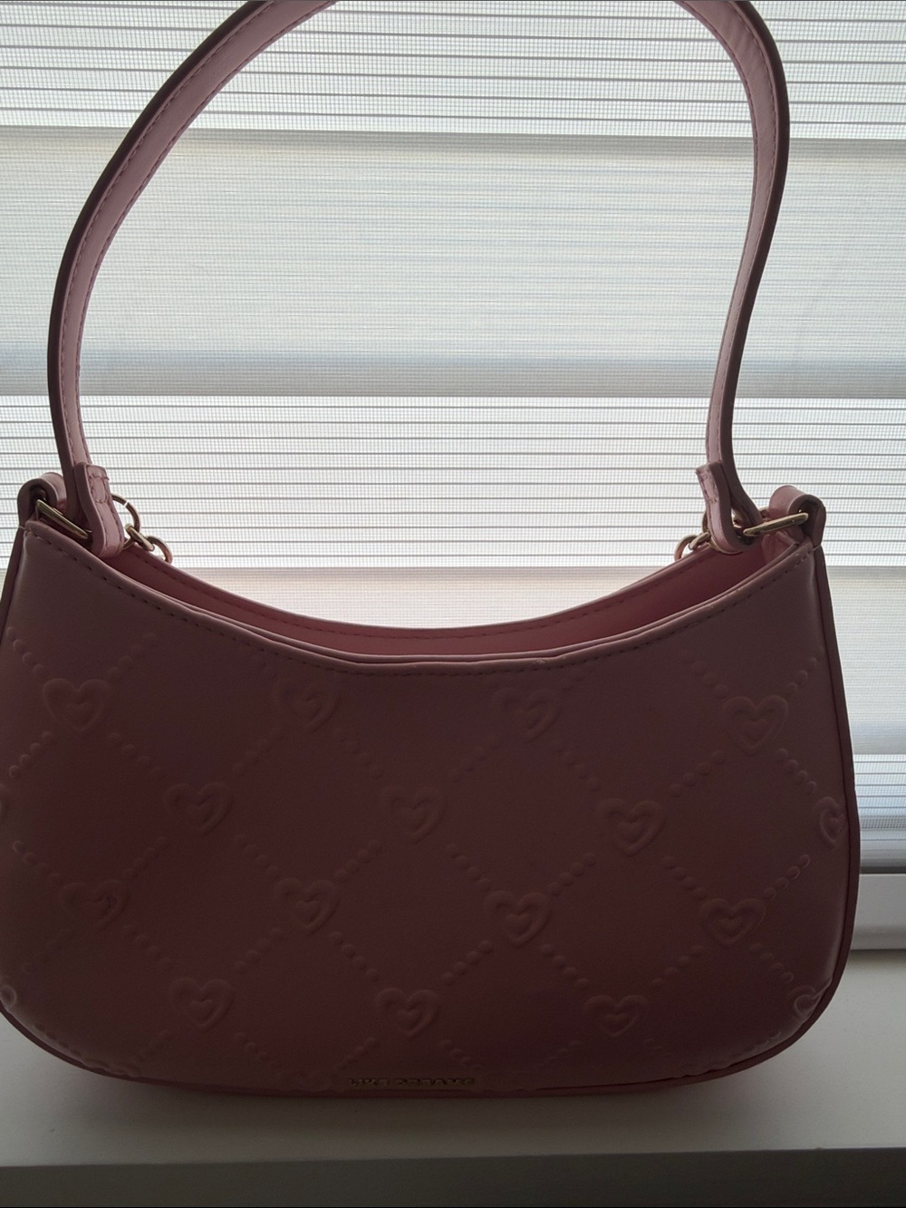 Elegant Pink Shoulder Bag with Embossed Heart Pattern